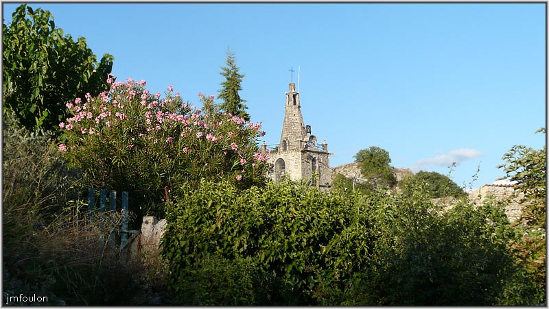 eglise-15web.jpg - Le clocher depuis les jardins