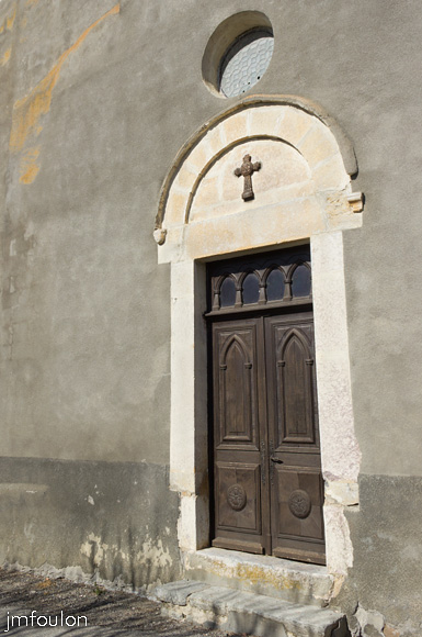 melve-croix-59.jpg - La porte de l'église (Ouest)